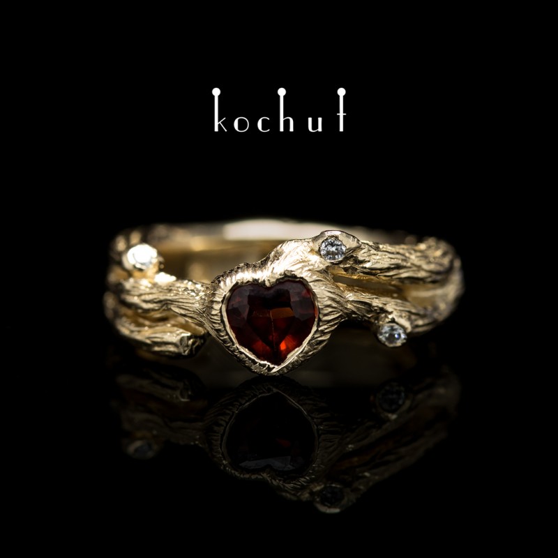 Ring «Twig». Red gold, red heart shaped garnet