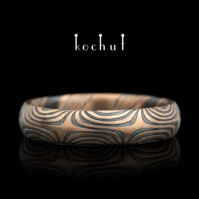 Wedding ring mokume «Orion». Red gold, etched silver, oxidized