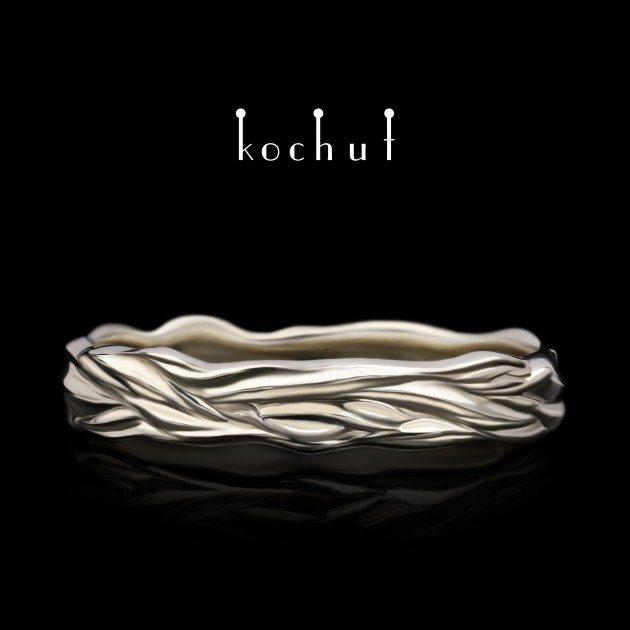 Snubní prsten «Vlny lásky». Bílé zlato