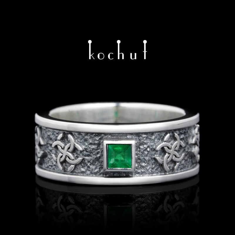 Flat-shaped wedding ring «Genus amulet». Silver, emerald, oxidized 