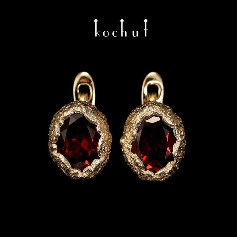 Earrings "Soul and body." English castle, silver, gold, garnets