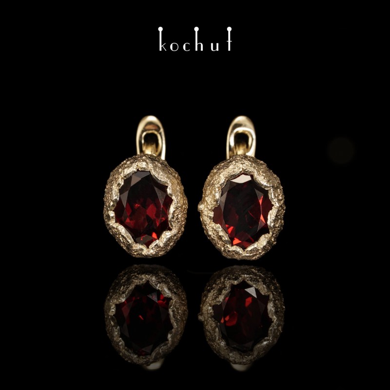 Earrings "Soul and body." English castle, silver, gold, garnets