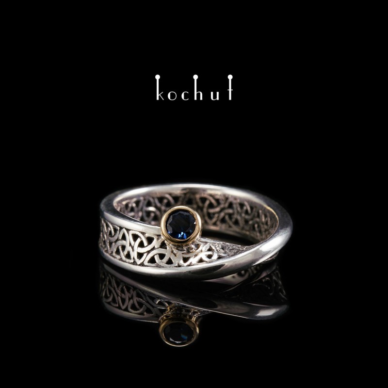 Ring "Celtic ribbon of Mobius". Silver, gold, sapphire