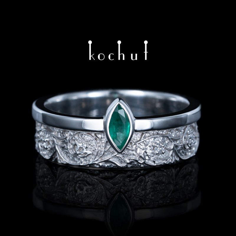 Wedding ring «Harmony of nature». White gold, emerald, diamonds, white rhodium