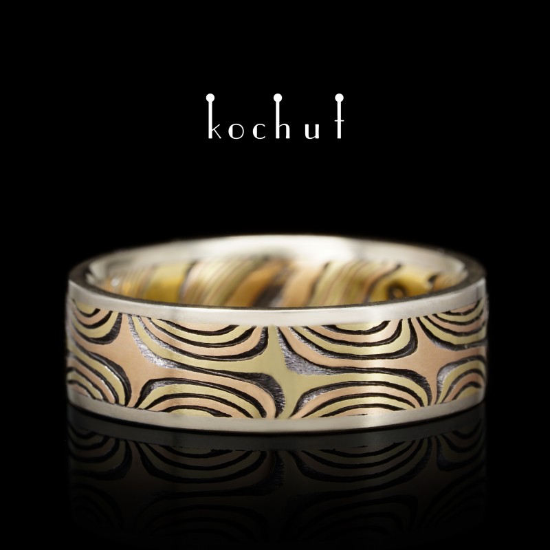 Ring mokume «The shining of the Eastern Stars». White, yellow, red gold, etched silver, oxidized