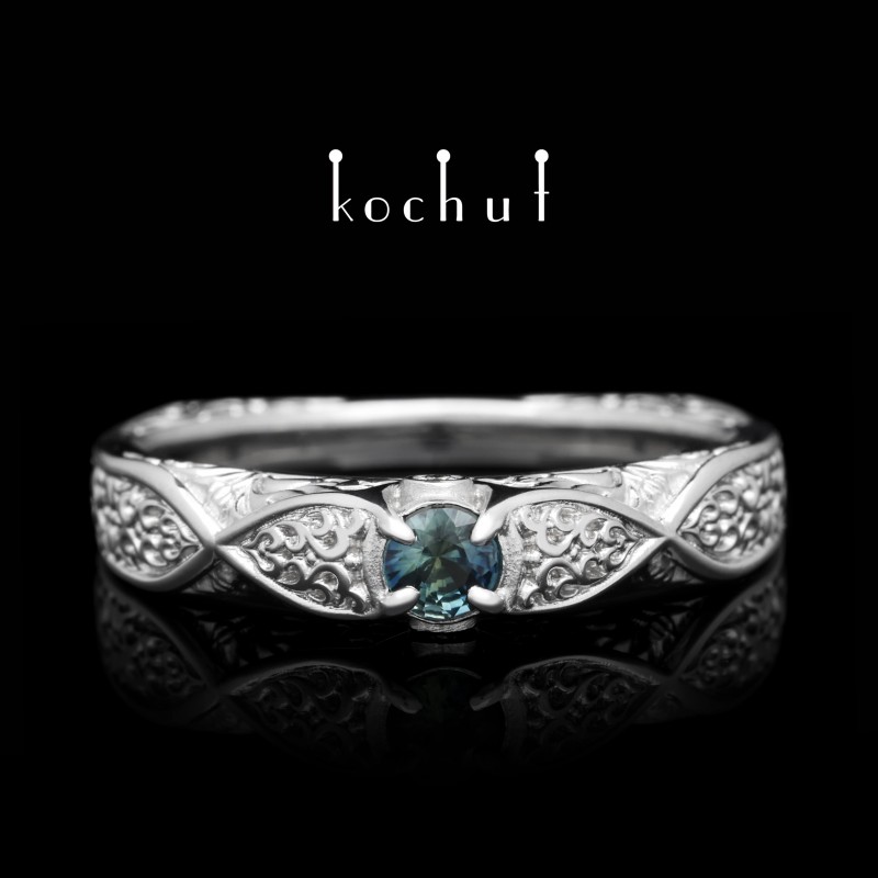 Engagement ring «Versailles». White gold, blue-green sapphire, diamonds, white rhodium