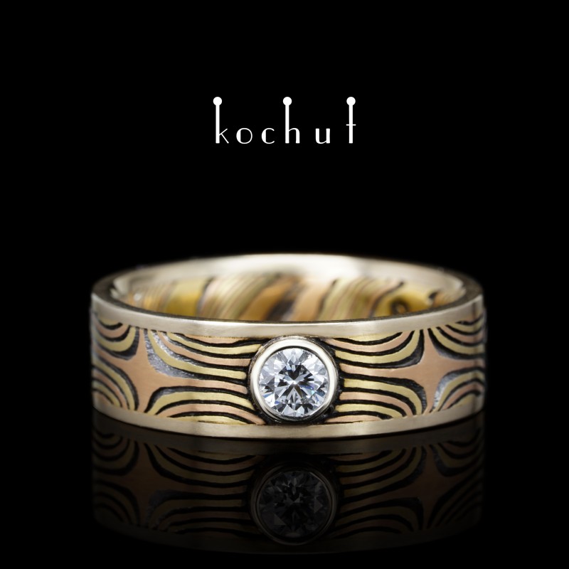 Ring mokume «The shining of the Eastern Stars» White, yellow, red gold, etched silver, diamond, oxidized