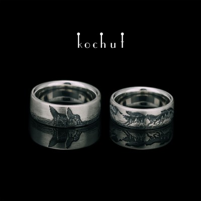 Flat shaped wedding rings «Wolves». Silver, oxidized