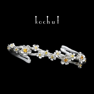 Bracelet «Floral». Silver, white rhodium, yellow and orange sapphires