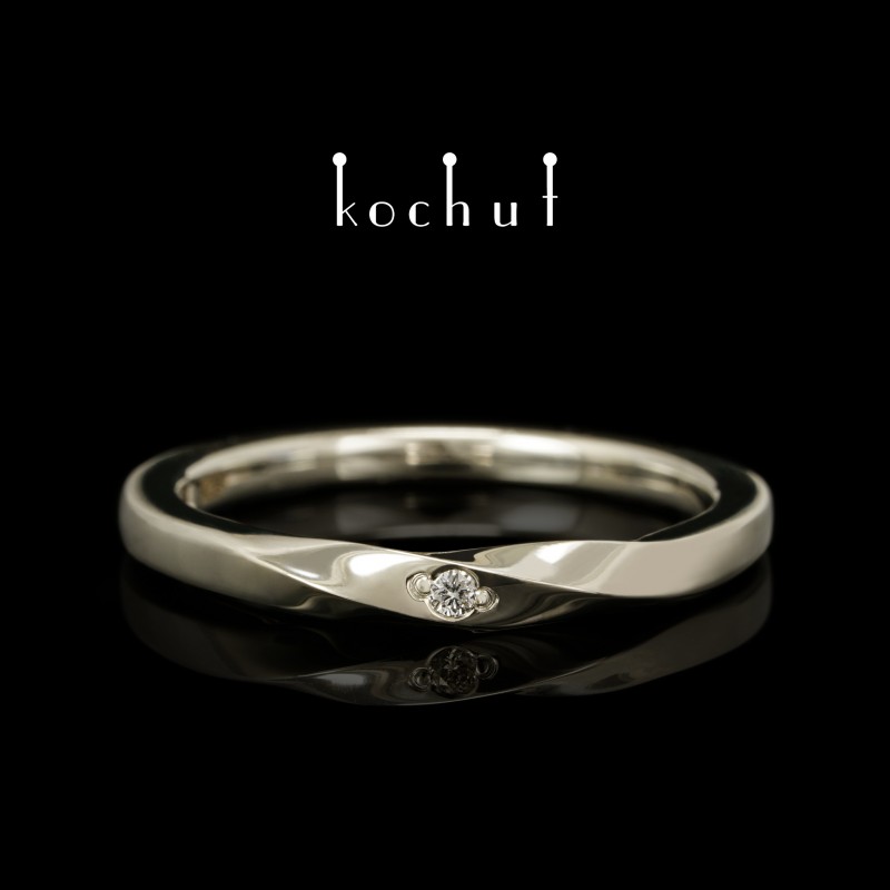 Narrowed wedding ring "Mobius ribbon". White gold, diamond