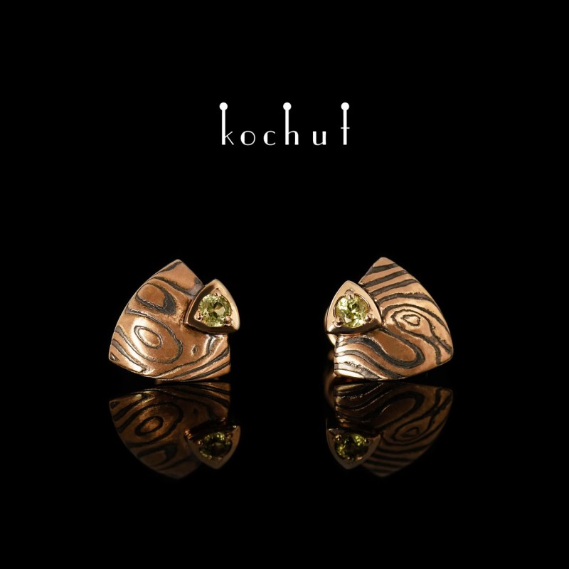 Earrings mokume «Seiche». Red gold, etched silver, chrysolite, oxidized