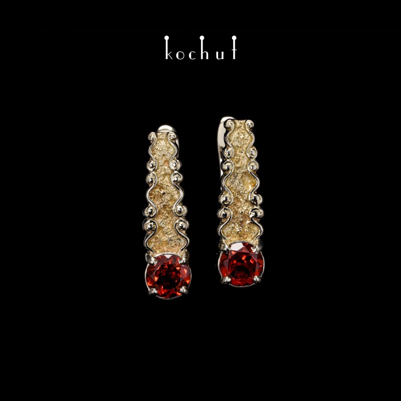 Earrings «Marquis». White and yellow gold, garnets