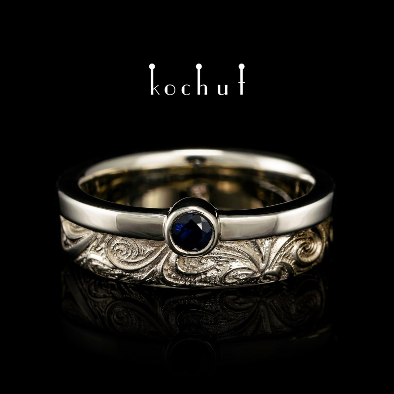 Wedding ring «In joy and sorrow: halves». White gold, sapphire