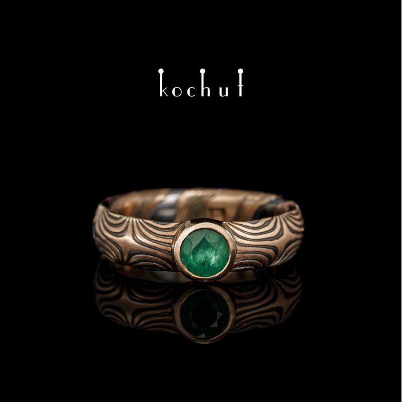 Ring mokume «Orion». Silver, red gold, emerald