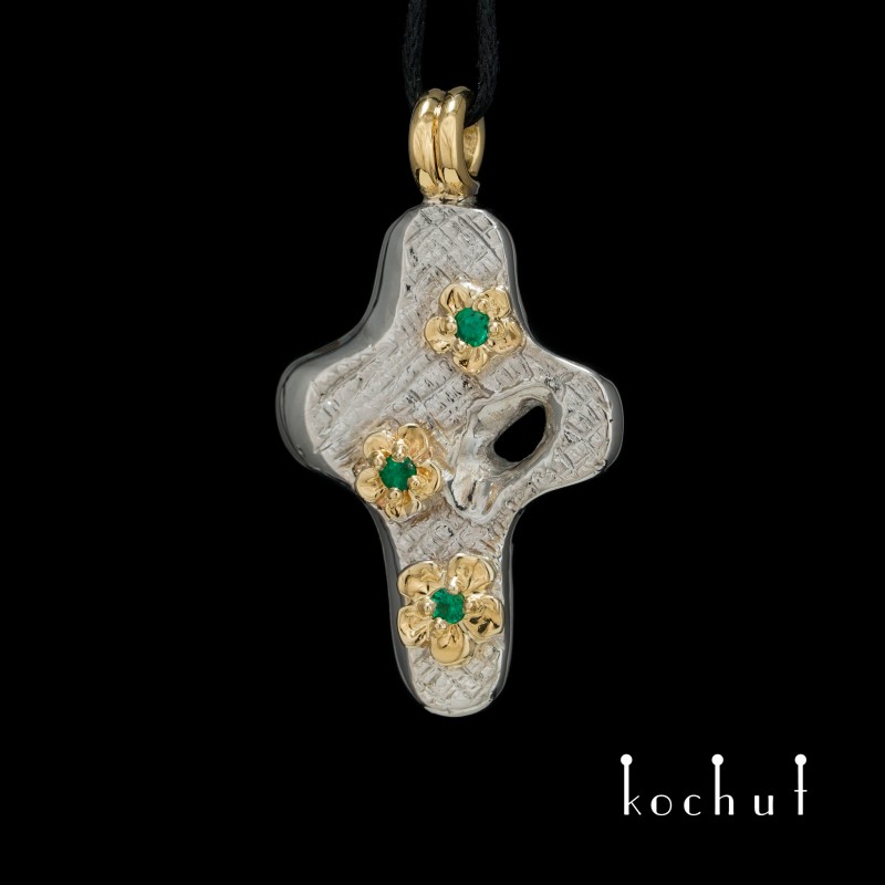 The silver cross "Delight Of The Soul" made with yellow gold and emeralds