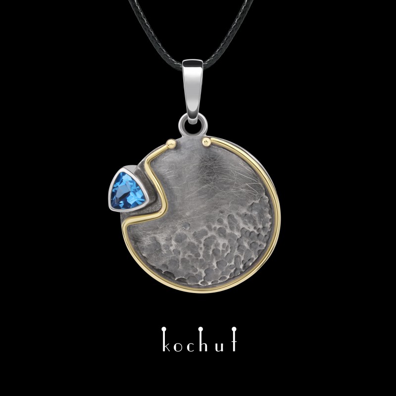 Pendant «Arctic sunrise». Yellow gold, silver, topaz, oxidized