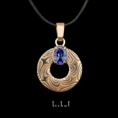 Mokume pendant «Precious astrolabe». Red and white gold, etched silver, tanzanite