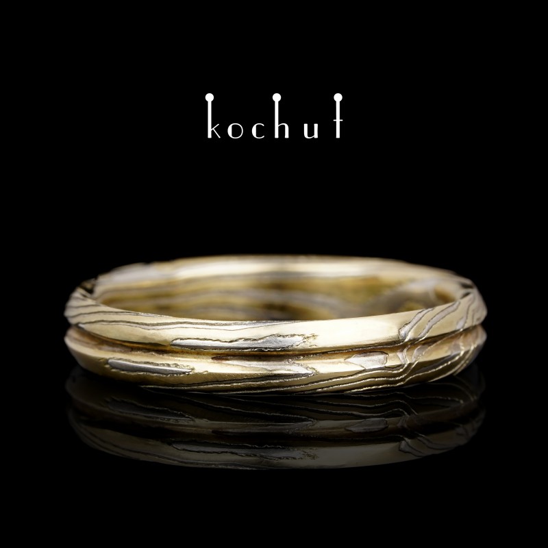 Ring «Axis of love». Yellow gold, etched silver