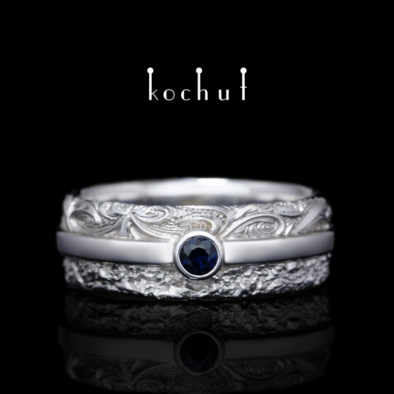 Wedding ring «In joy and in sorrow.» White gold, white rhodium, sapphire 