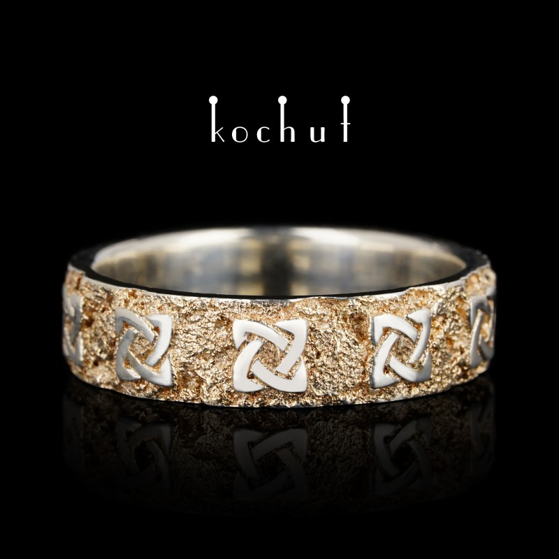 Flat-shaped wedding ring «Celtic amulet». Silver, surfacing yellow gold