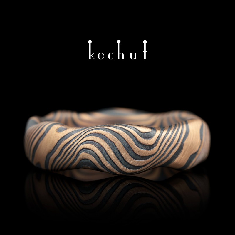 Seamles wedding ring mokume «Waves». Red gold, etched silver, oxidized