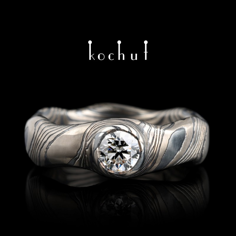 Seamless mokume ring «Polar lights». Palladium gold, etched silver, diamond, oxidized