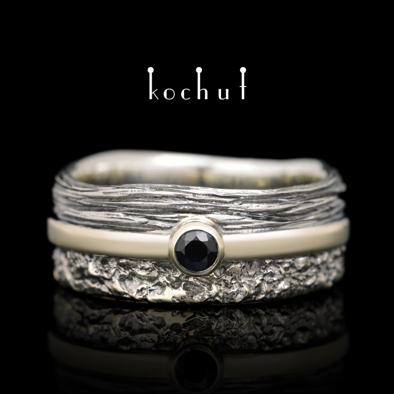 In joy and sorrow: foundation — wedding ring made of white gold and silver with sapphire, coated with black rhodium