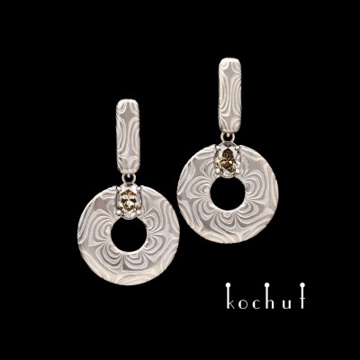 Mokume earrings «Precious Astrolabe». Palladium gold, etched silver, emeralds, oxidation