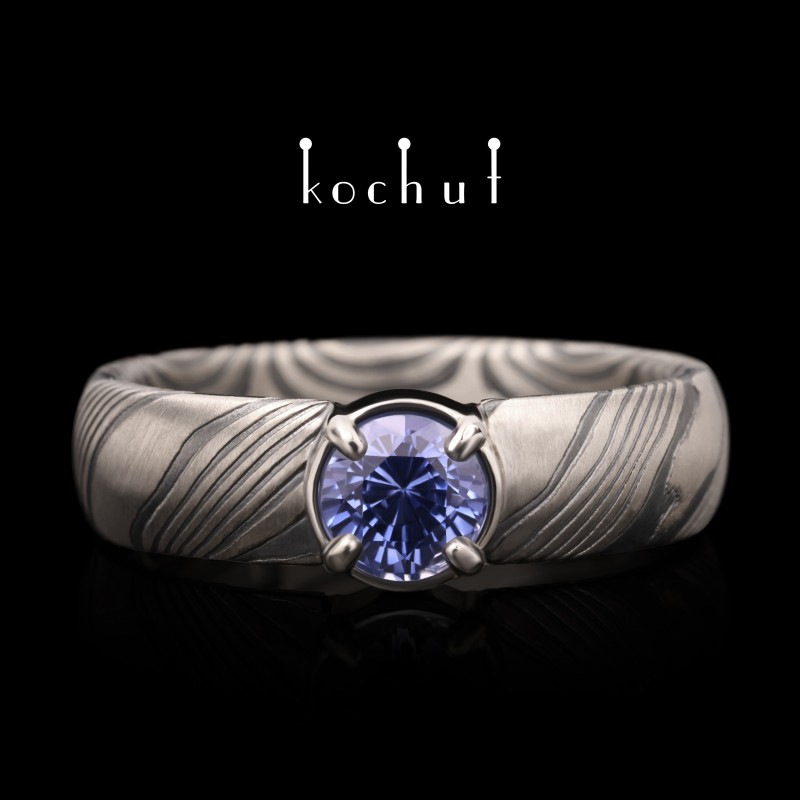 Ring mokume «Scintillation». Palladium gold, etched silver, cornflower sapphire, oxidized