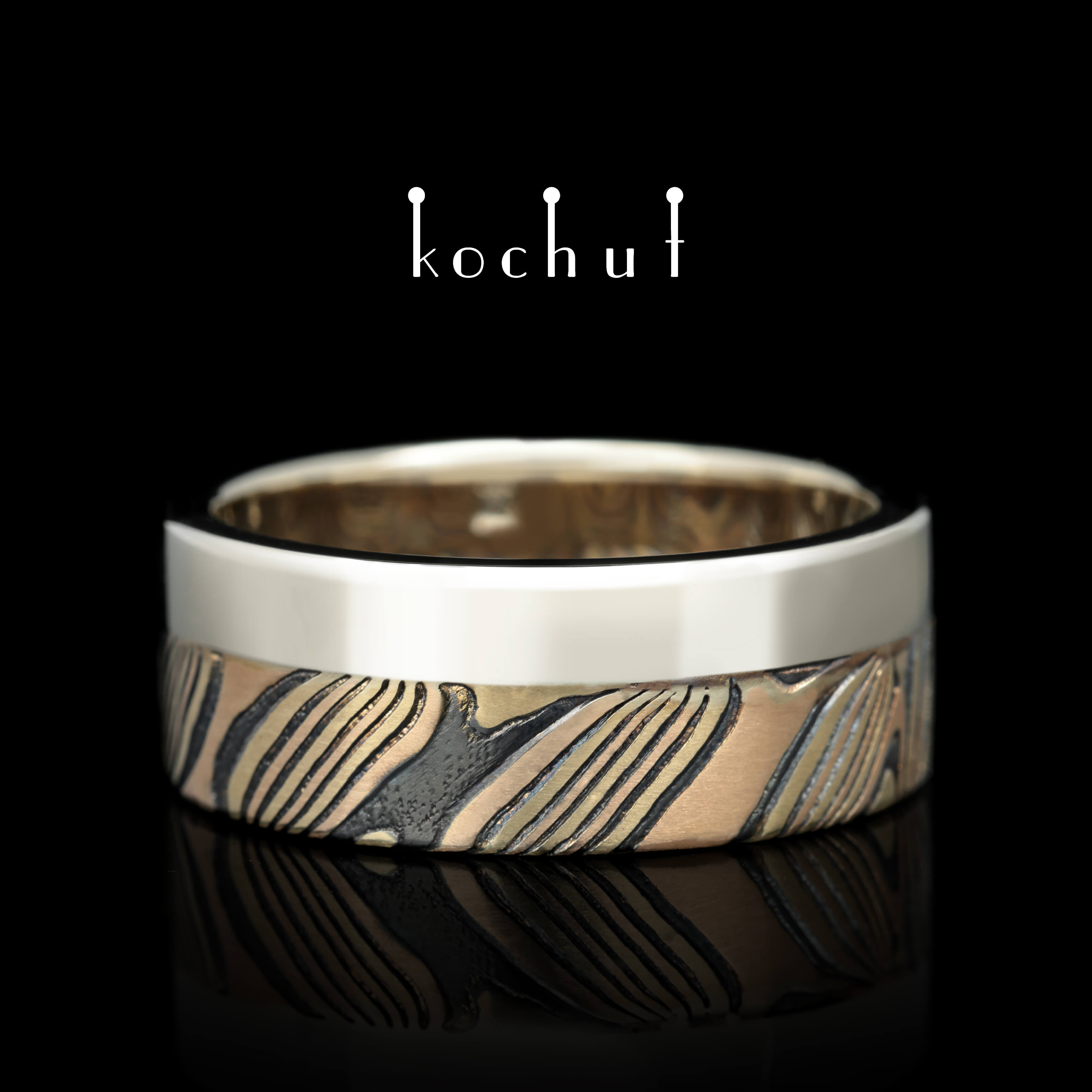 Seamless mokume wedding ring «Kado». White, yellow and red gold, etched silver, oxidized 