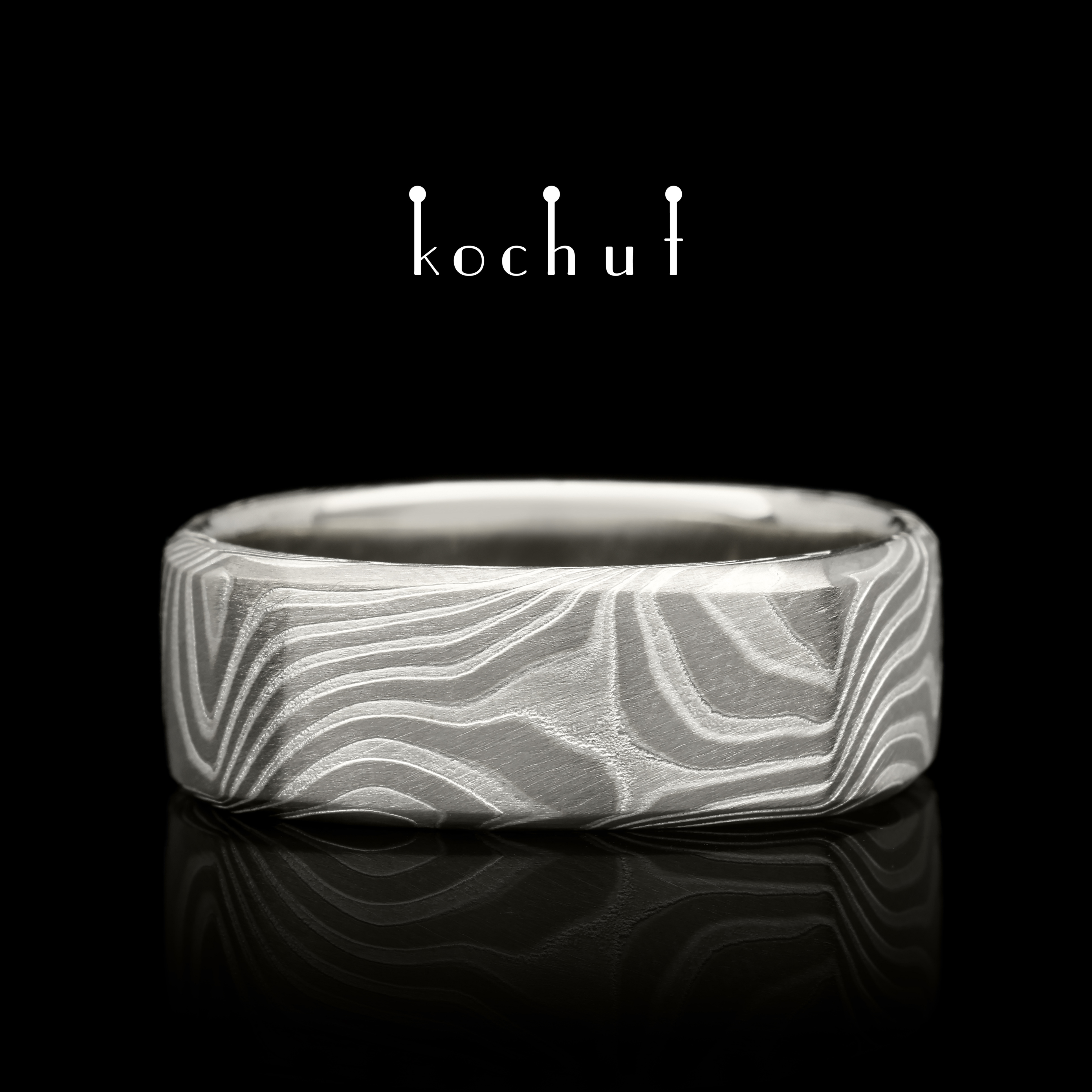Mokume ring «Tenno». Palladium gold, white gold, etched silver